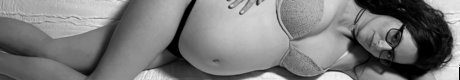 Pregnant Priss erotic star photo