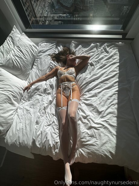 Naughtynursedemi model top photos