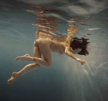 busty redhead onlyfans erotic photo