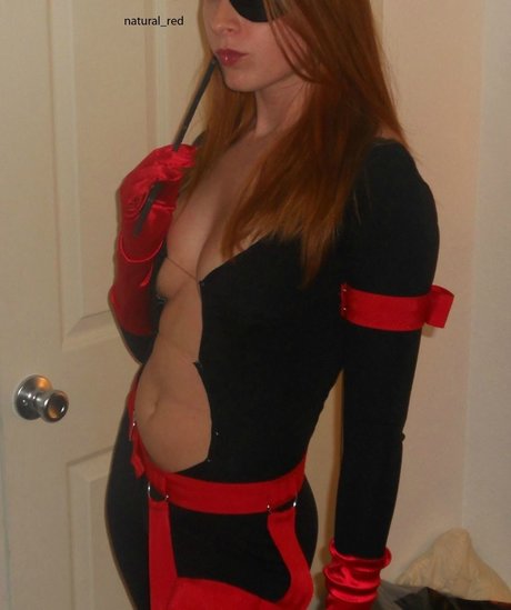 Natural Red pornstar adult photo