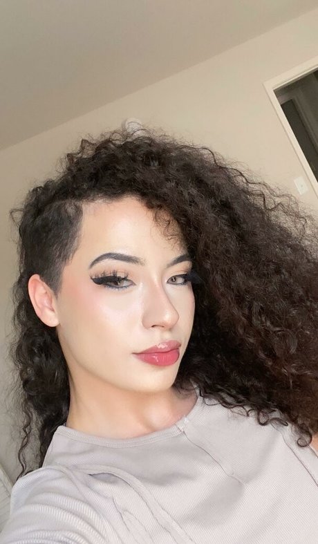 Curly Exotic beautiful pornstar photo