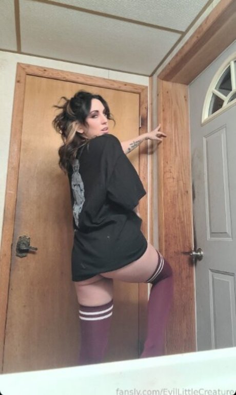 Evil Little Creature naked pornstar img