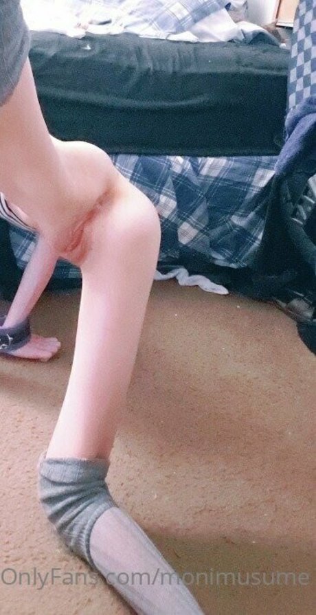 Monimusume hermosa estrella porno foto