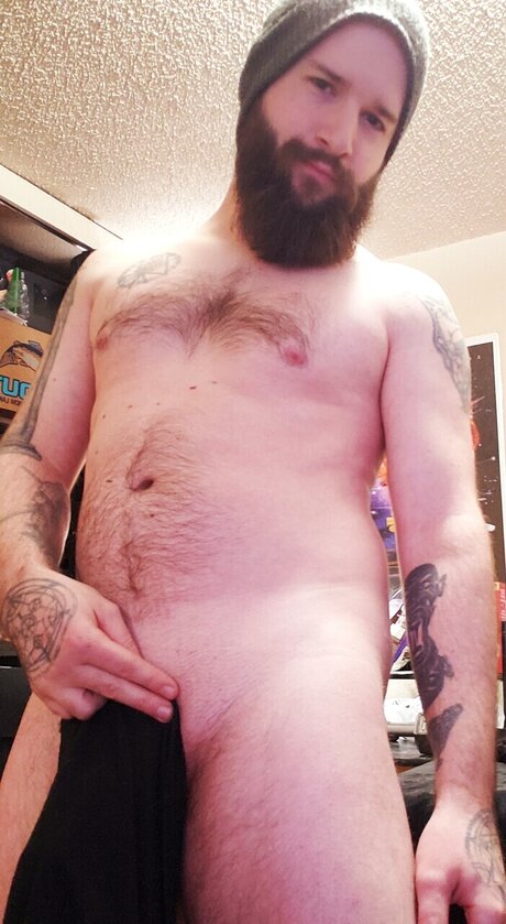 SingleTattooedStud modelo erótico galerías