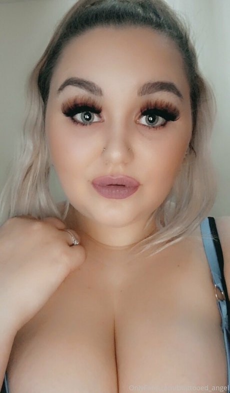 btattooed angel arte estelar foto