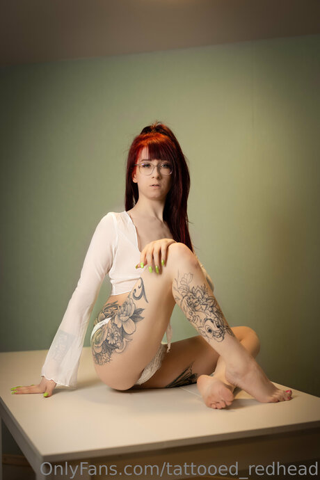 Tattooed Redhead profile image